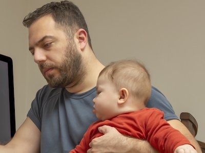 Father with baby wondering how to modify child support after a life change