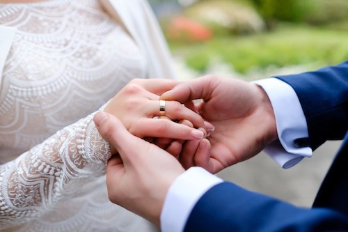 A couple getting married after learning how many times they can get married in Texas