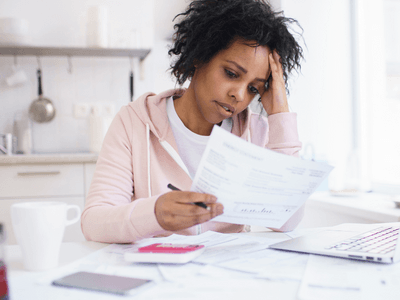 Woman figuring out how to start over with no money after a divorce is finalized.