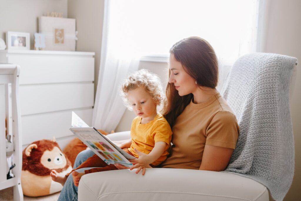 Mom reading a story to her baby